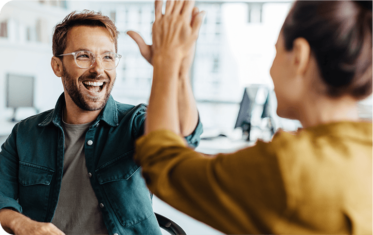 Colleagues giving a high-five